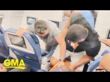 Passengers subdue off-duty flight attendant making threats near cockpit