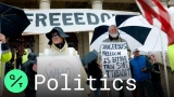 Michigan Residents Flood State Capitol to Protest Whitmer’s Stay-At-Home Order